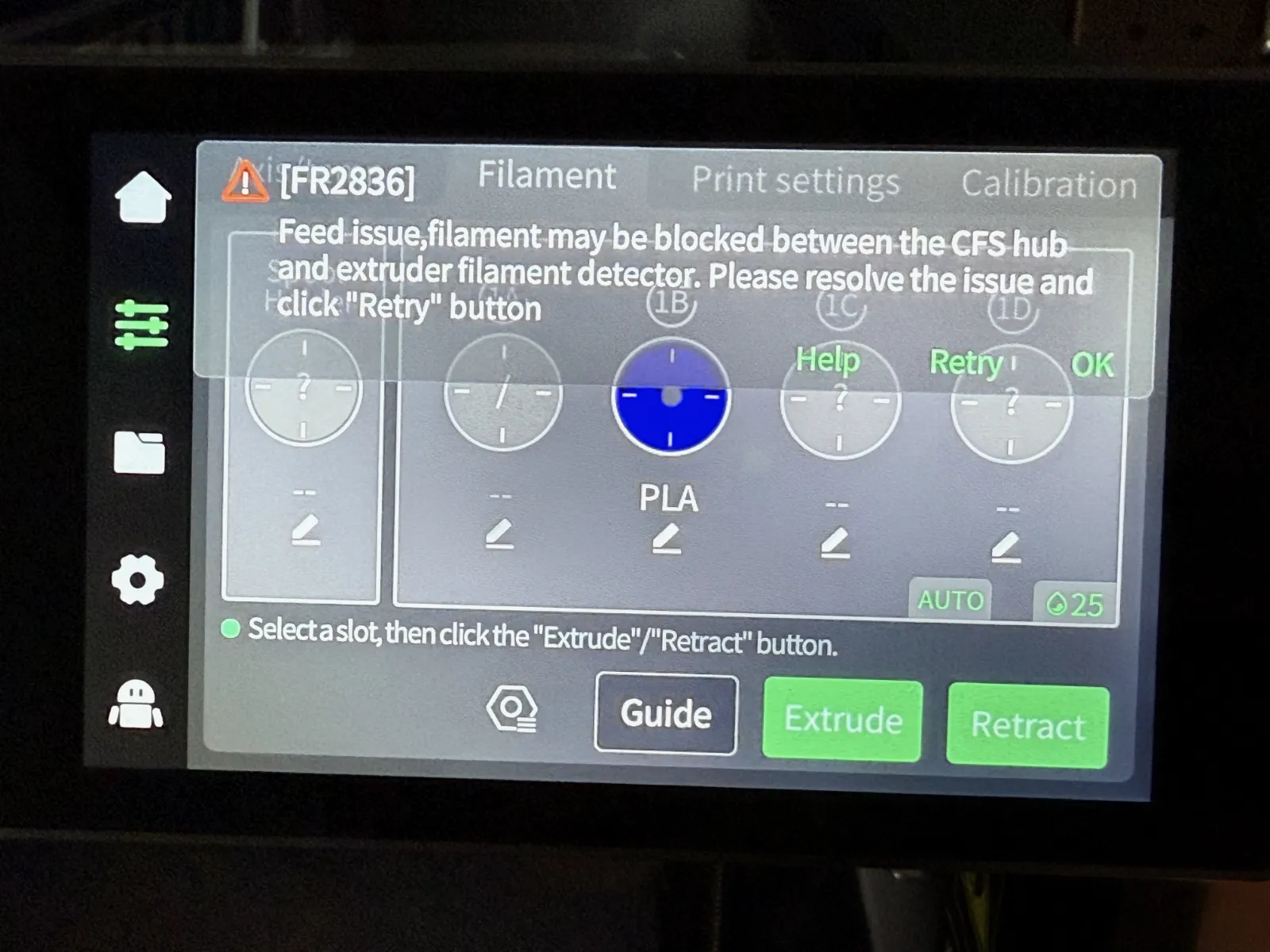 a picture of the Creality K2 Plus, the error "FR2836: Feed issue, filament may be blocked between CFS and extruder detector" is visible