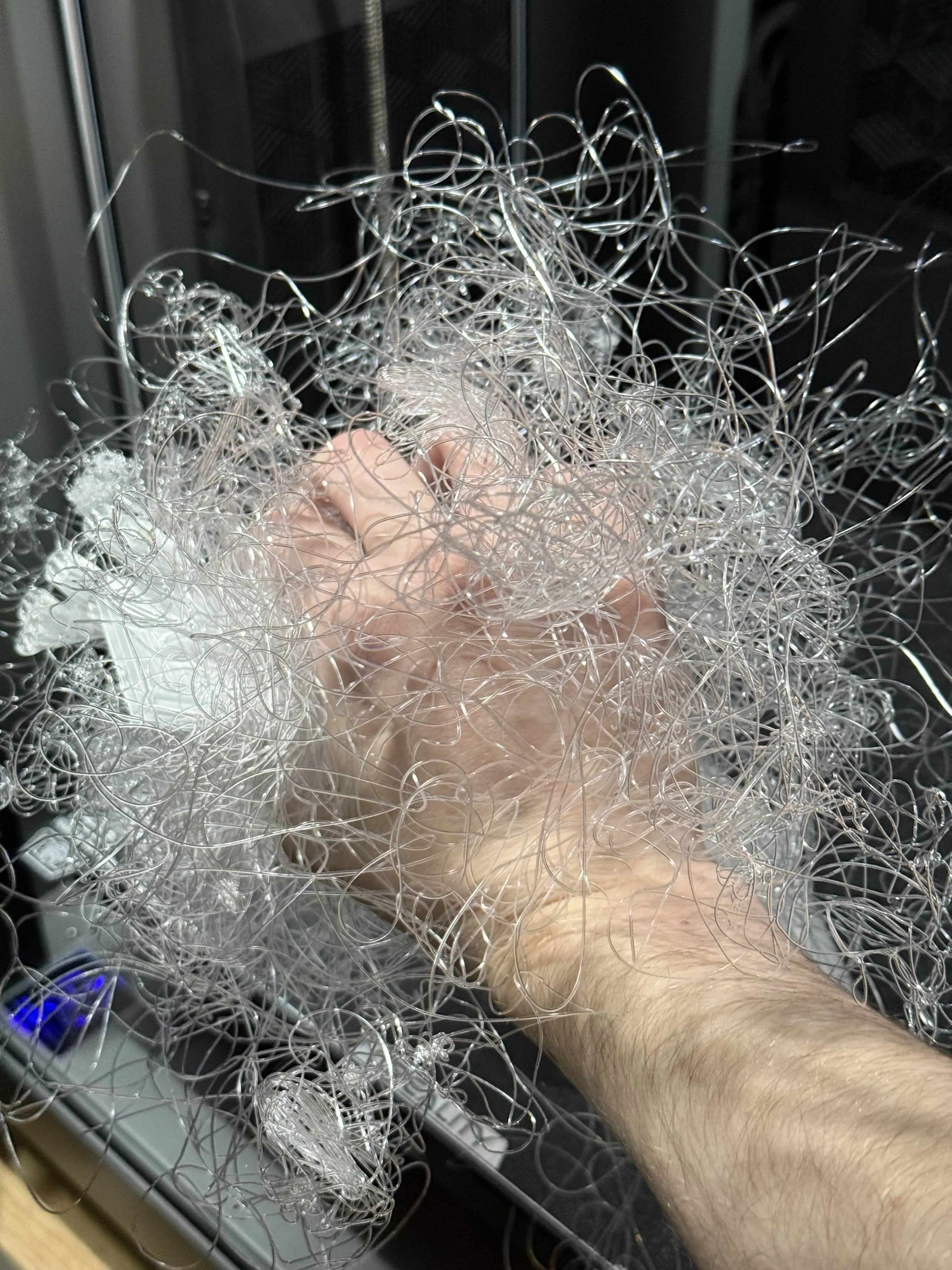 a photo of absolute 3D printer spaghetti